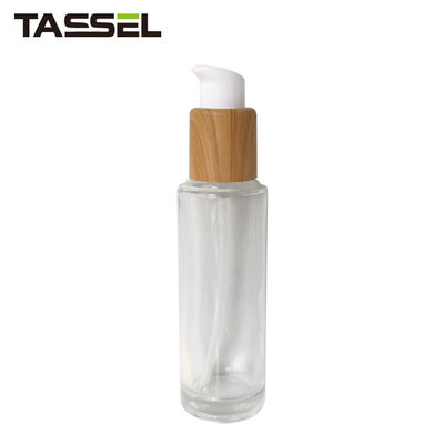 30ml 50ml Round Glass Bottle With Wooden Effect Treatment Pump Lock Type
