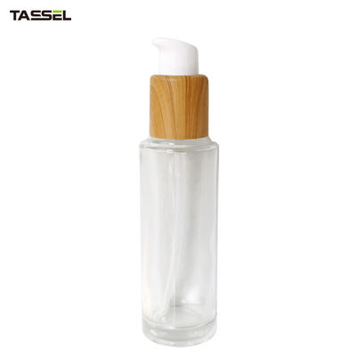 30ml 50ml Round Glass Bottle With Wooden Effect Treatment Pump Lock Type