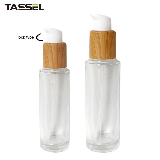 30ml 50ml Round Glass Bottle With Wooden Effect Treatment Pump Lock Type
